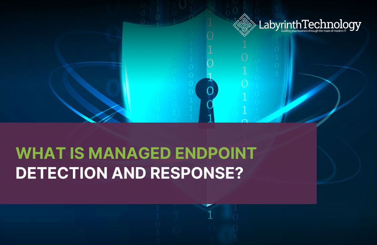 The background is blue with a light blue shield with a ring of designed data around it. On the left side there is a textbox saying "What Is Managed Endpoint Detection and Response?" In the top right corner, there is the Labyrinth Technology logo.