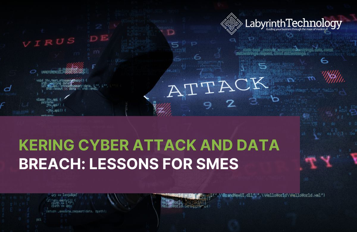 A hooded hacker in dark clothing holding a laptop and credit card, with digital code, the word “ATTACK,” and terms like “virus,” “malware,” and “security breach” projected in the background. The text reads "Kering Cyber Attack and Data Breach: Lessons for SMEs." The Labyrinth Technology logo is in the top right corner