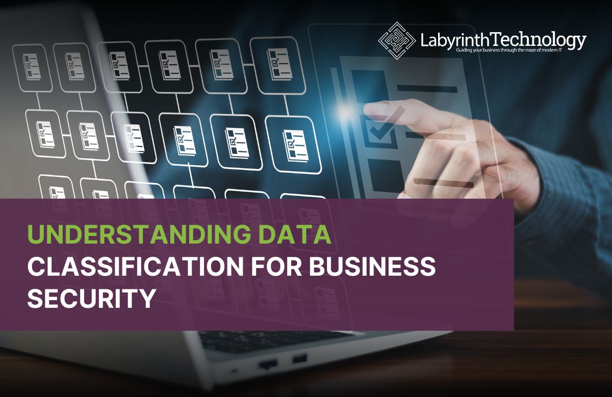 A professional using a laptop while interacting with a digital interface showing structured documents and checklists, representing data classification and secure document management. The Labyrinth Technology logo is in the top right. The text reads "Understanding Data Classification For Business Security"